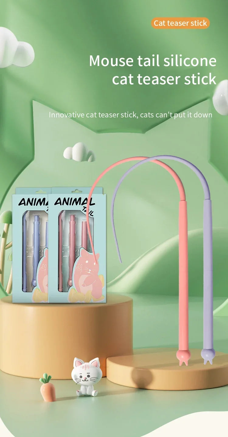 A pink and purple silicone mouse tail cat teaser stick toy is displayed next to a box featuring an animal design.