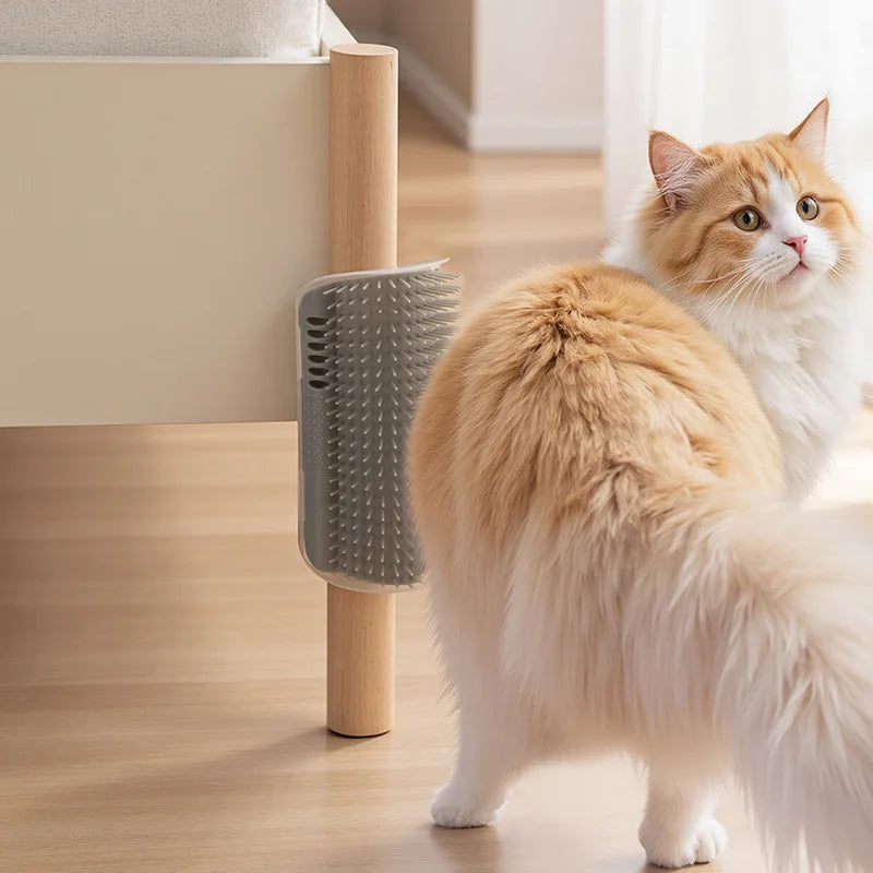 A fluffy orange and white cat is grooming itself using a self-grooming brush mounted on a wooden post.