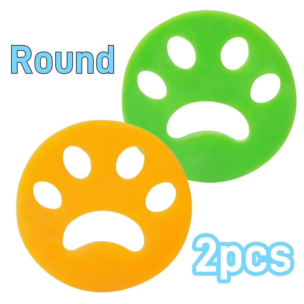 Two round silicone lint rollers, one green and one orange, for removing pet hair or lint.