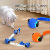 A gray cat interacts with an intelligent blue and orange ball toy designed for cats.