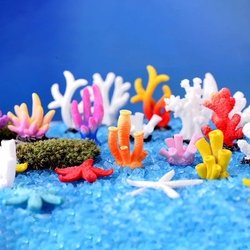 Colorful resin coral aquarium decorations in various bright colors like orange pink yellow and white