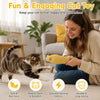 A woman is playing with a yellow fish-shaped cat toy for her cat indoors.