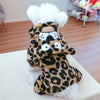 A plush fleece pet overalls for dogs and cats featuring a leopard print pattern and white faux fur trim.