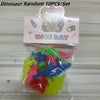 A clear plastic bag containing ten colorful soft rubber bath toys for kids