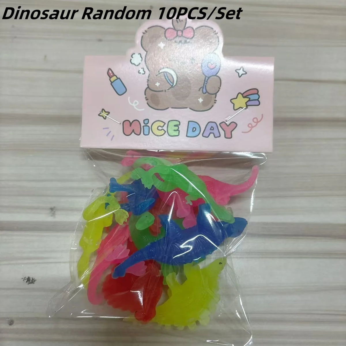 A clear plastic bag containing ten colorful soft rubber bath toys for kids