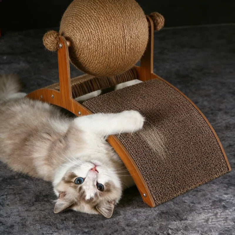 A fluffy gray and white cat is relaxing on a wooden scratching board with a sisal rope for scratching.