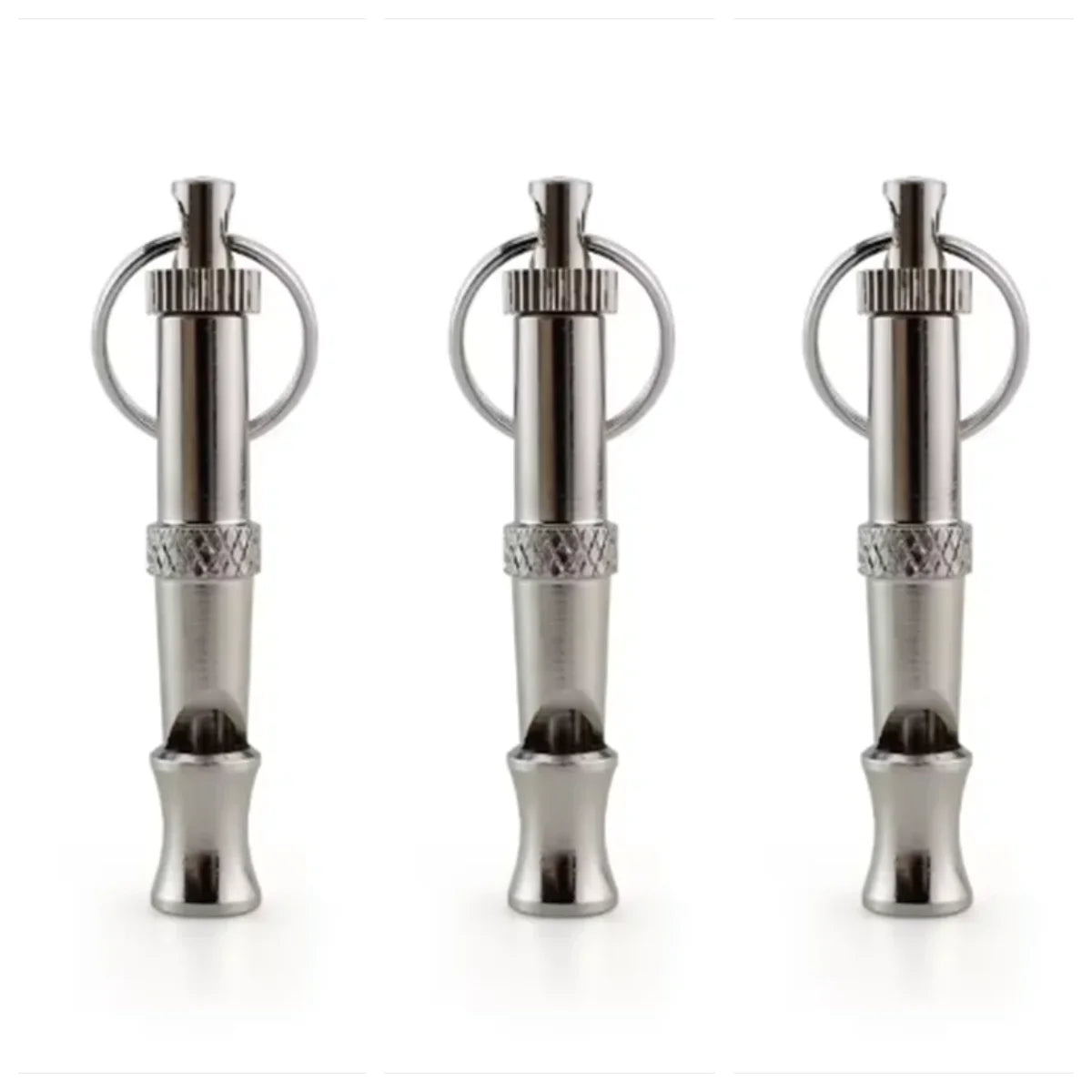 Three stainless steel ultrasonic dog training whistles displayed vertically.