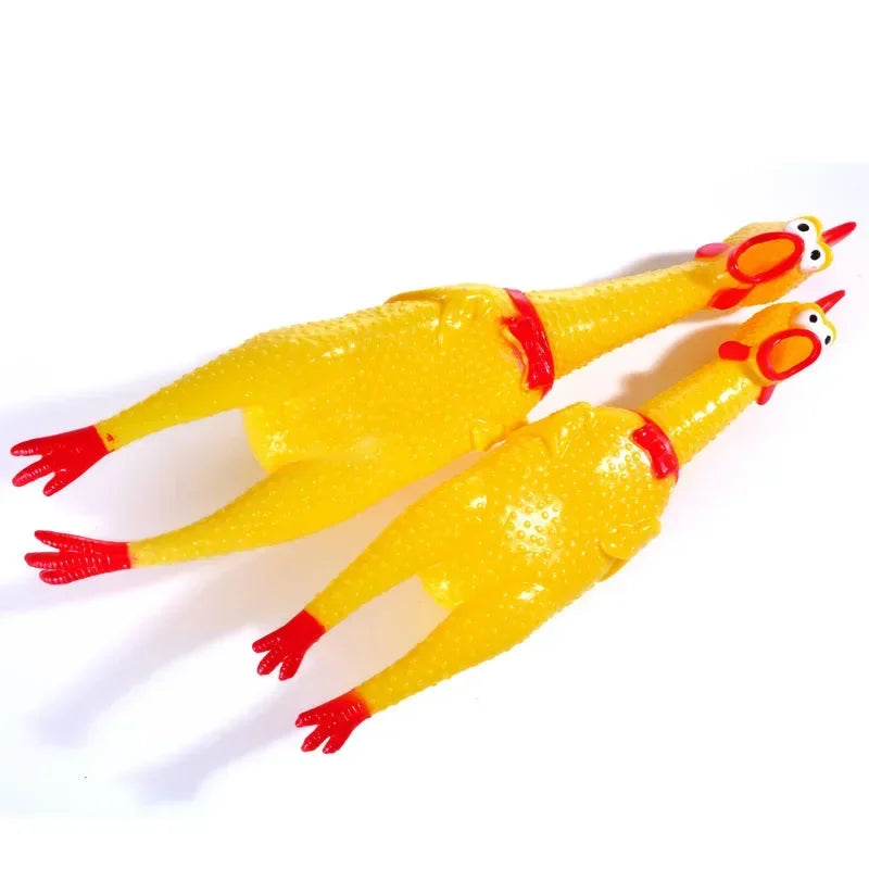 Yellow rubber screaming chicken squeaky dog toy with red accents