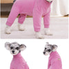 A pink thermal fleece dog jumpsuit for winter warmth, shown in a standing and lying pose.