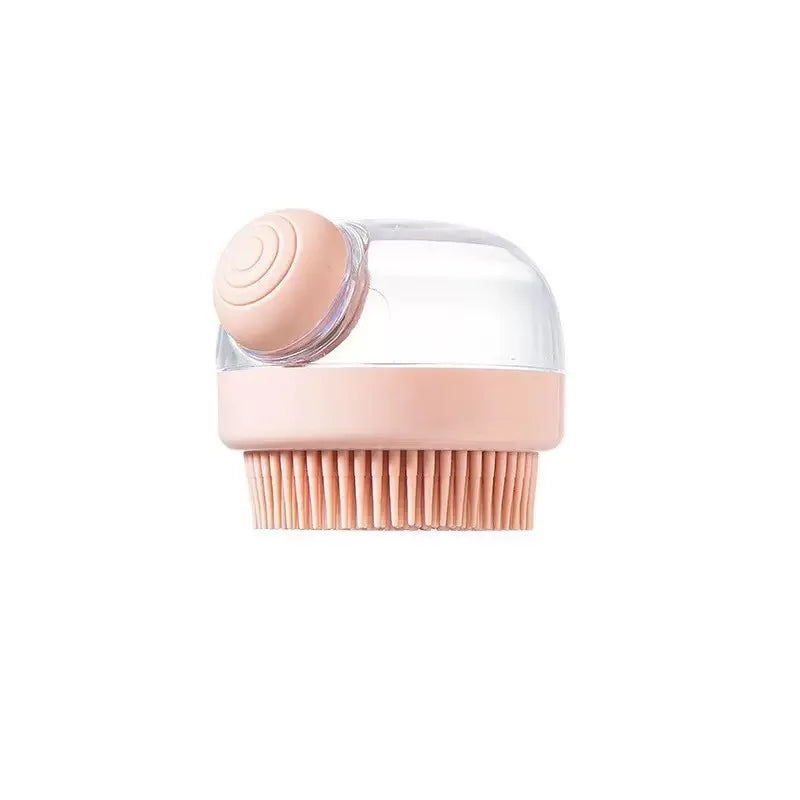 A pink pet bath brush with soft silicone bristles for dogs and cats.