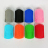 A set of eight silicone massage brushes in various colors including gray, black, blue, pink, cyan, orange, green, and red.