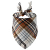 A plaid bandana with fringed tassels in shades of brown, tan, gray, and blue.