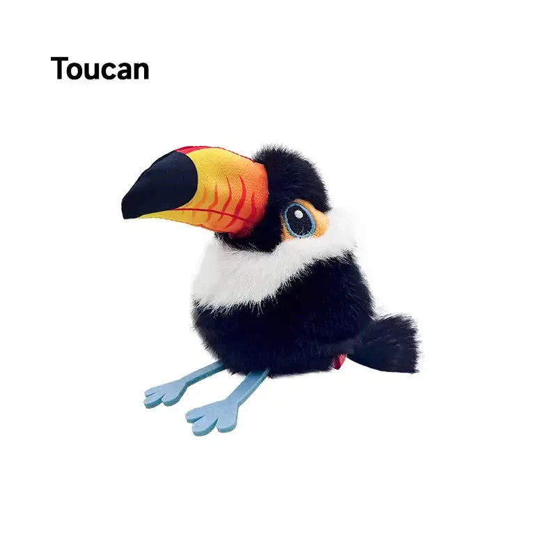 A plush toucan toy with a black body, white chest, and brightly colored beak.
