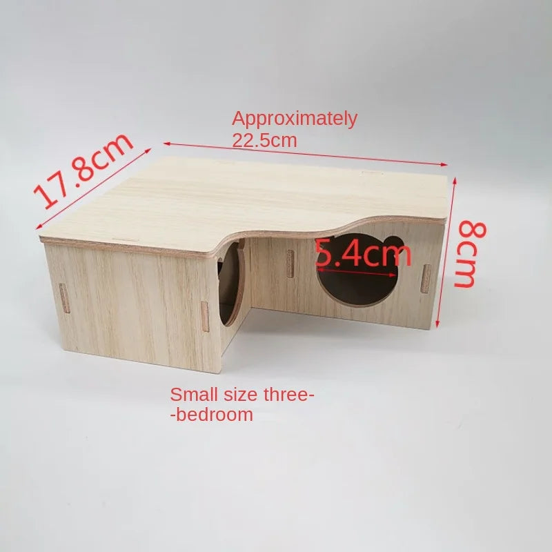A light wood wooden multi-room maze playhouse for hamsters shown from the side with dimensions marked.