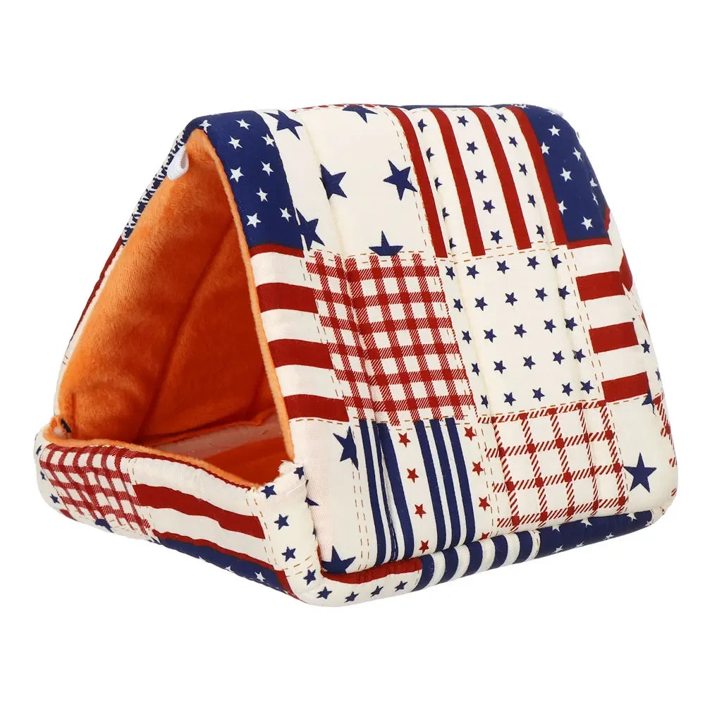 A square pet nest bed made of red, white, and blue plaid fabric with star patterns.