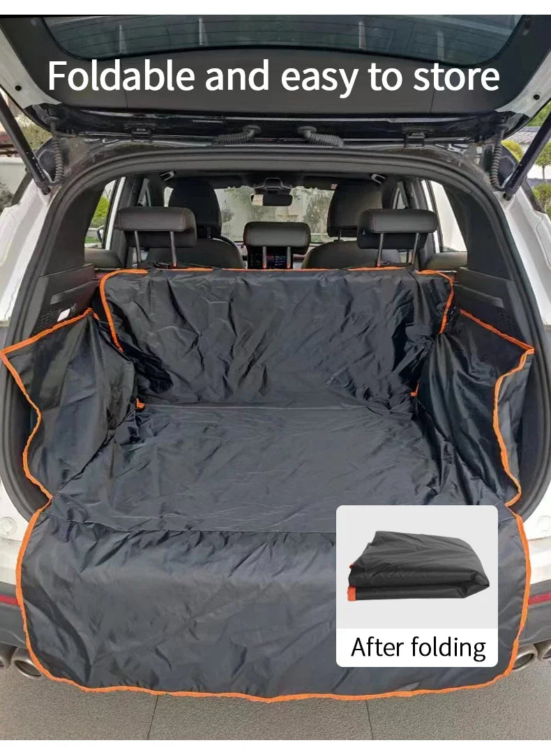 Foldable black waterproof cargo liner for dogs shown inside an SUV trunk.