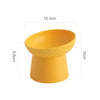 A bright yellow elevated ceramic food bowl for pets, shown with dimensions 13.3cm wide and 8.8cm deep.