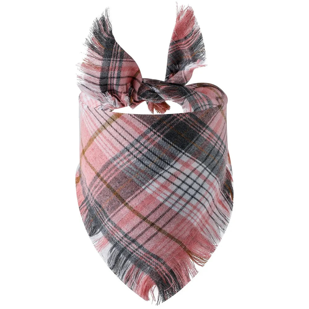 A plaid bandana featuring shades of pink, black, and brown with fringed edges.