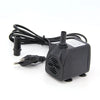Black submersible aquarium water pump with a cord and a connector.