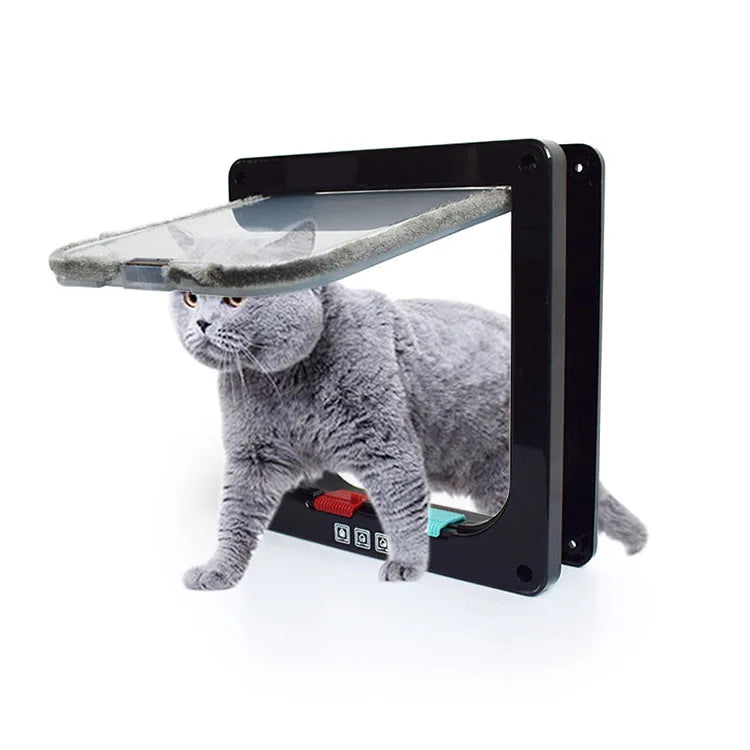 A gray cat is looking out of a black pet door with a clear safety flap.