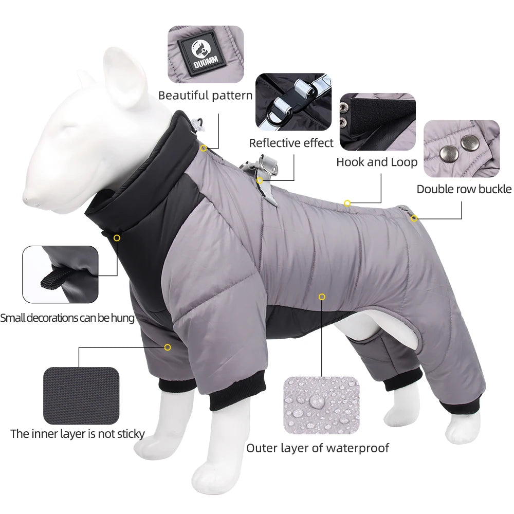 Veste de chien rembourrée grise avec bordure noire, détails réfléchissants et fermetures à velcro.