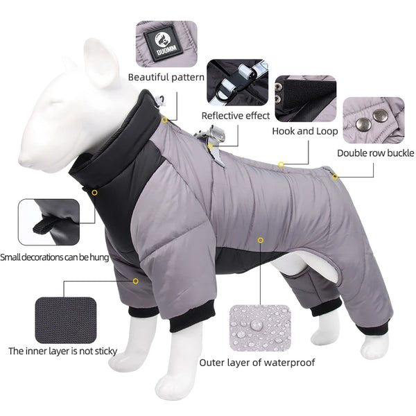 A gray padded dog jacket with black trim, featuring reflective details and hook and loop closures.