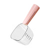A pink 2-in-1 pet food measuring scoop with a spoon for wet food, shown from above.