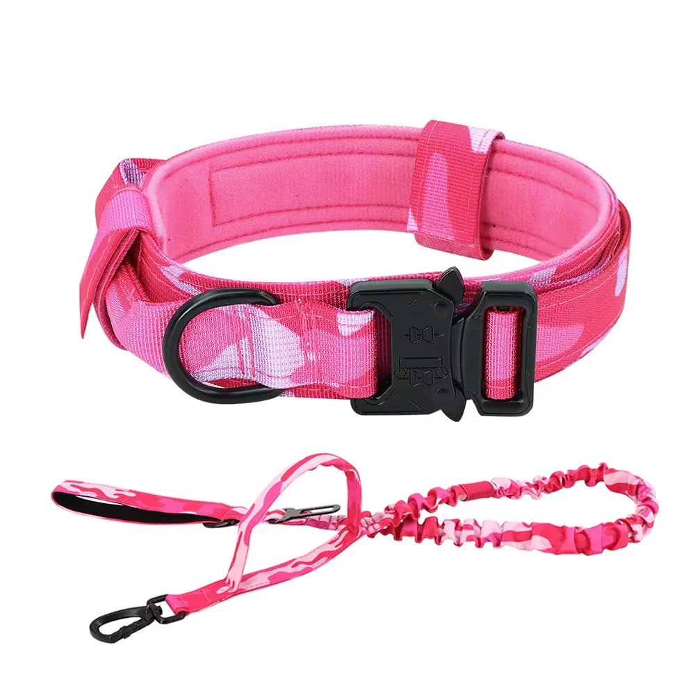 Pink tactical dog training collar and leash set with a black buckle and handle