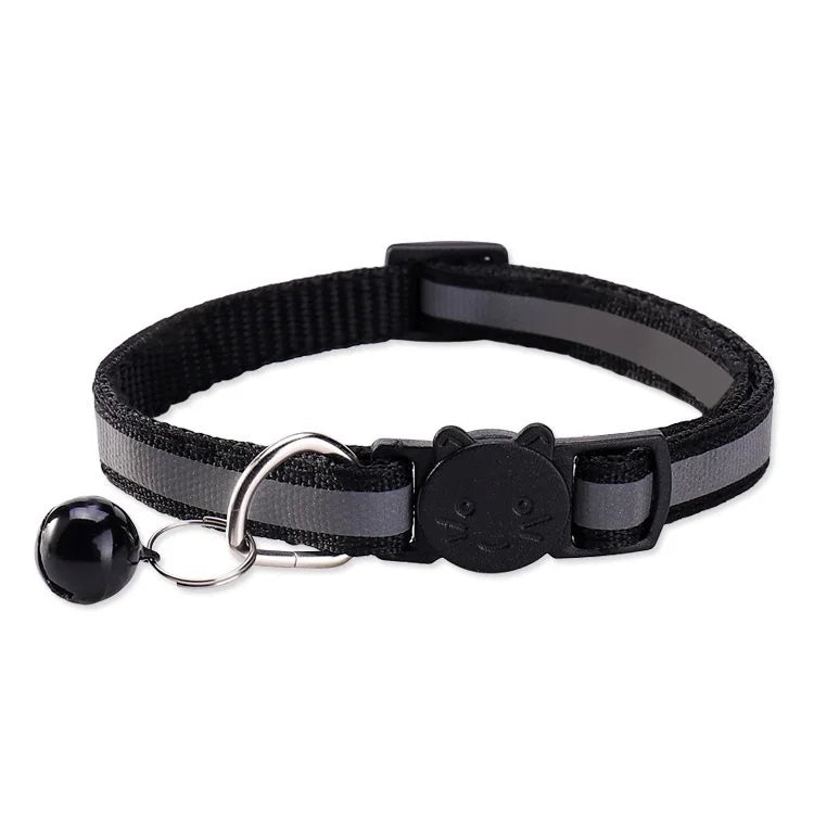 Black safety breakaway cat collar with a bell and adjustable strap.