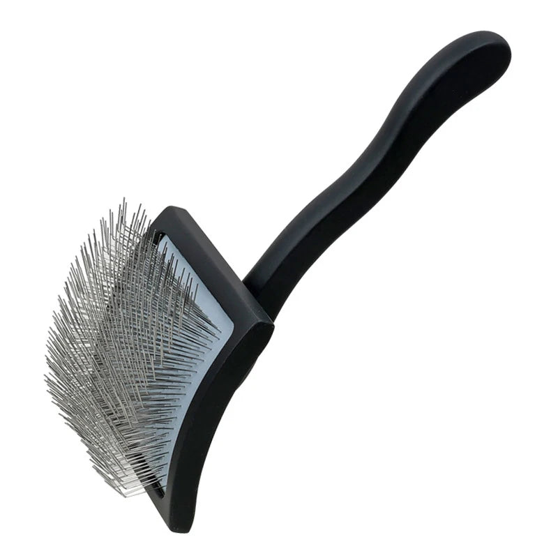 Black ergonomic pet grooming rake with stainless steel teeth.