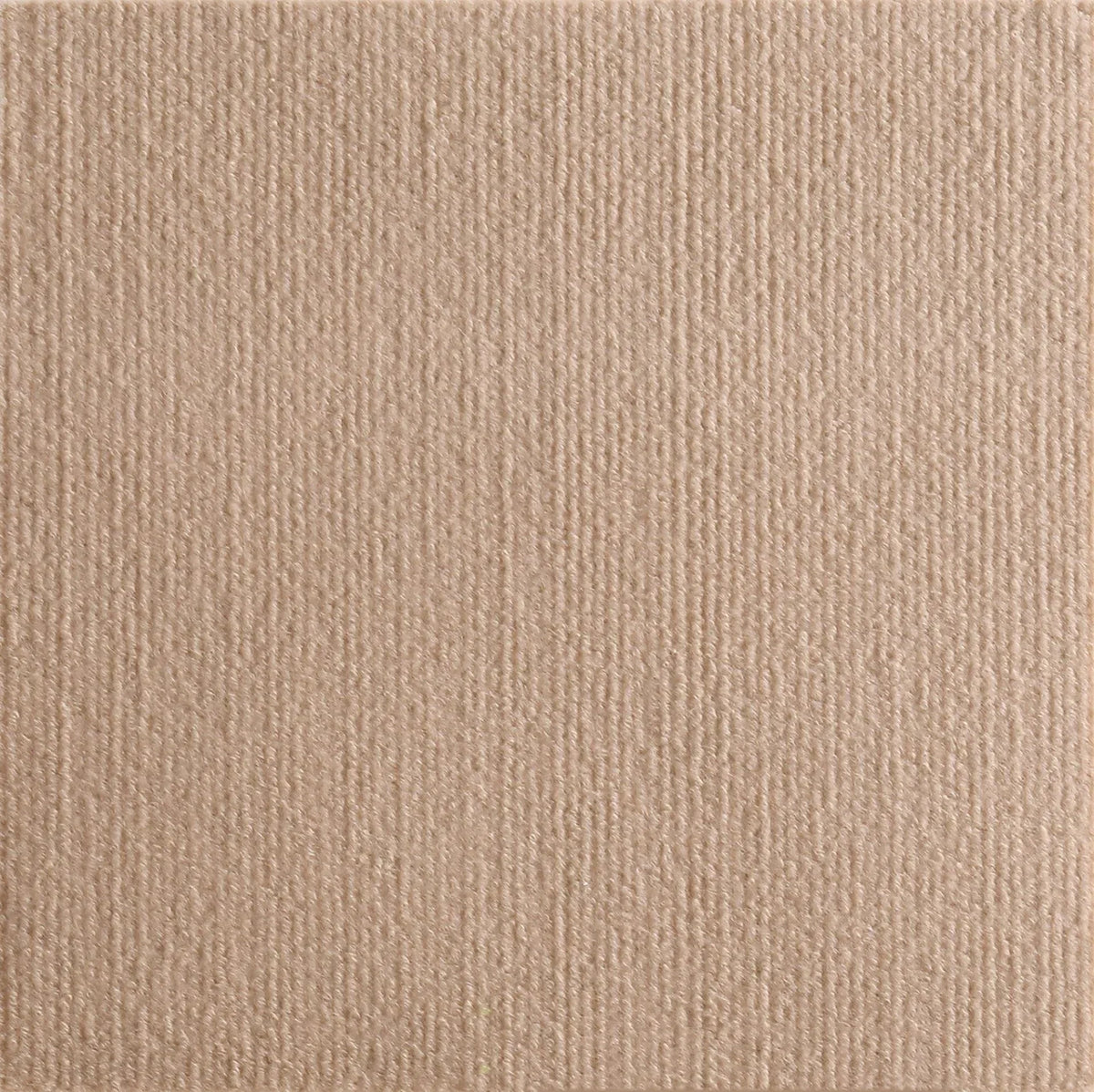 A close-up view of a beige self-adhesive furniture protector mat with a textured surface.