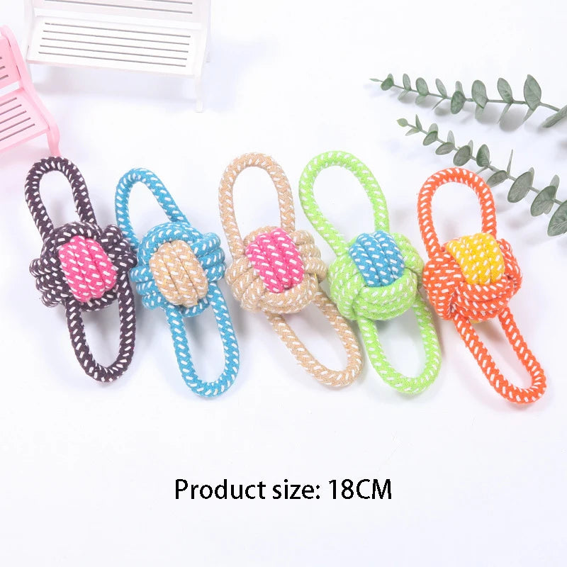 A set of eight colorful hemp rope chew toys for dogs, featuring various colors and textures.