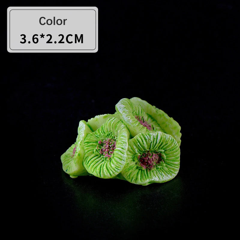 Green resin coral aquarium decoration showing a textured, vibrant green structure.