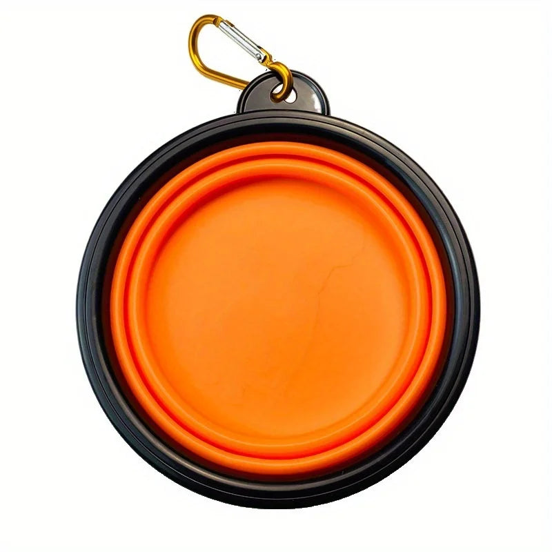 Tragbare Silikon-Hundeschale mit schwarzer Basis und leuchtend orangefarbenem Essbehälter, an einer goldfarbenen Kette befest
