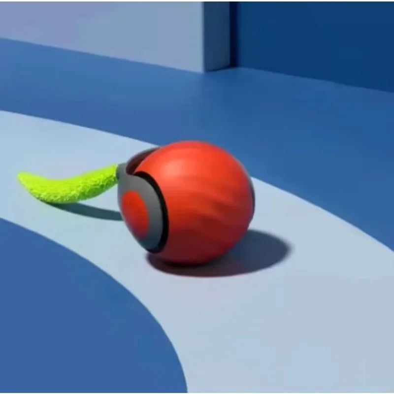 Rotes Rollspielzeug mit grünem Faux-Schwanz auf blauem Untergrund.