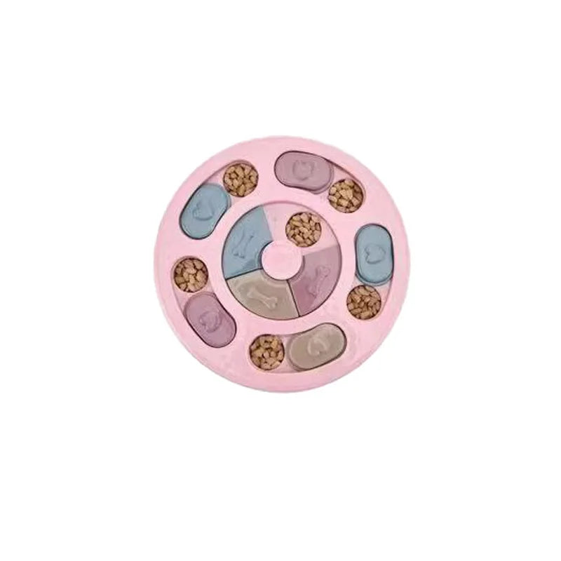 Jouet distributeur de puzzle rose pour chiens et chats avec des composants ronds de différentes couleurs.