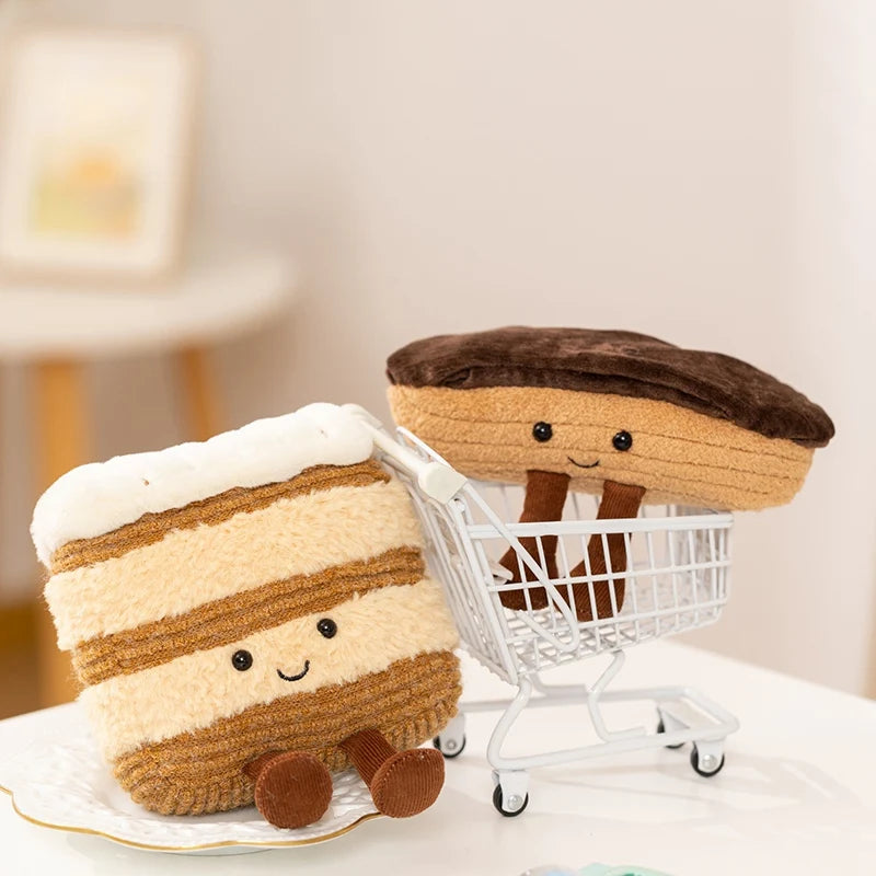 A cute brown and beige striped dessert plush toy sitting in a white shopping cart.
