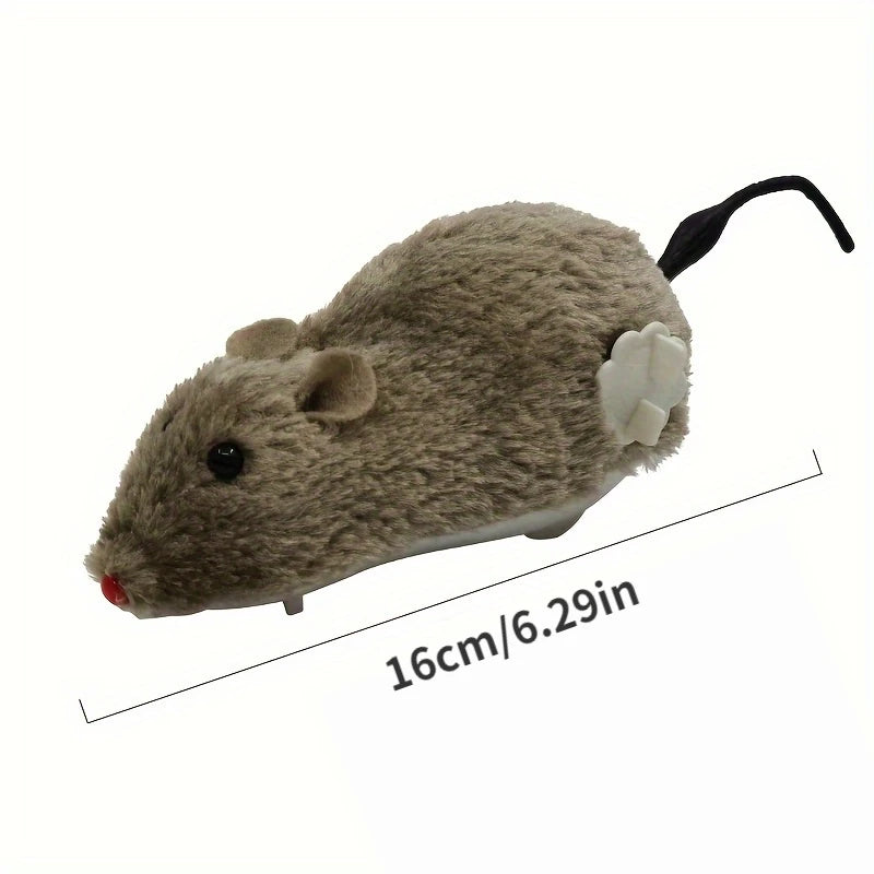A realistic gray plush mouse toy with black whiskers and a white ear, shown from the side.