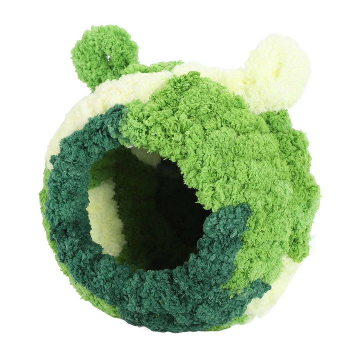 A fluffy, round bird nest bed made of green and white velvet fabric.