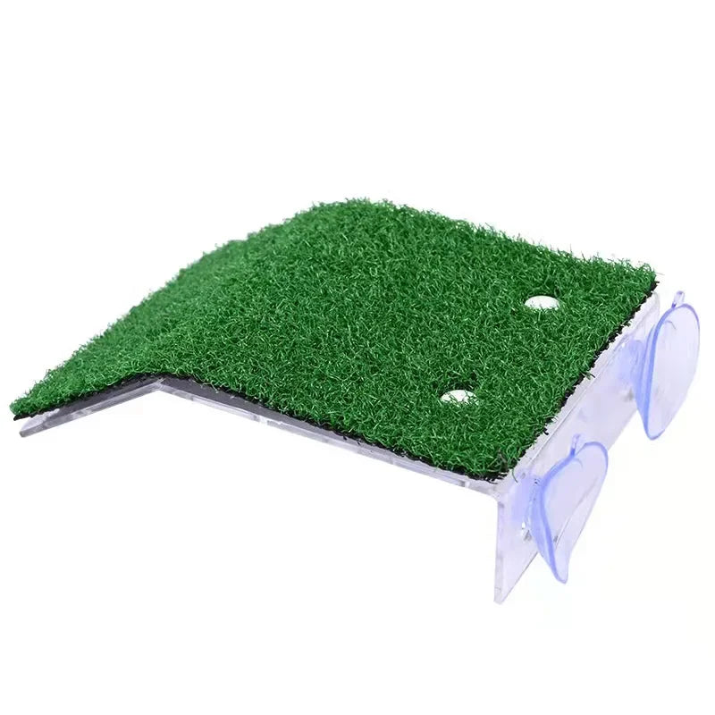 A green grass ramp platform with suction cups for a turtle basking area.