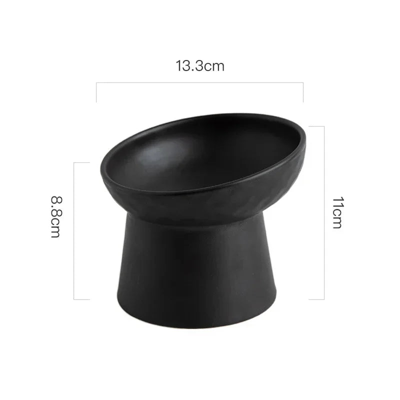 A black elevated ceramic food bowl for dogs and cats, shown from the side.