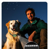 A man is pictured with a golden dog, demonstrating a worry-free night walking double protection product.