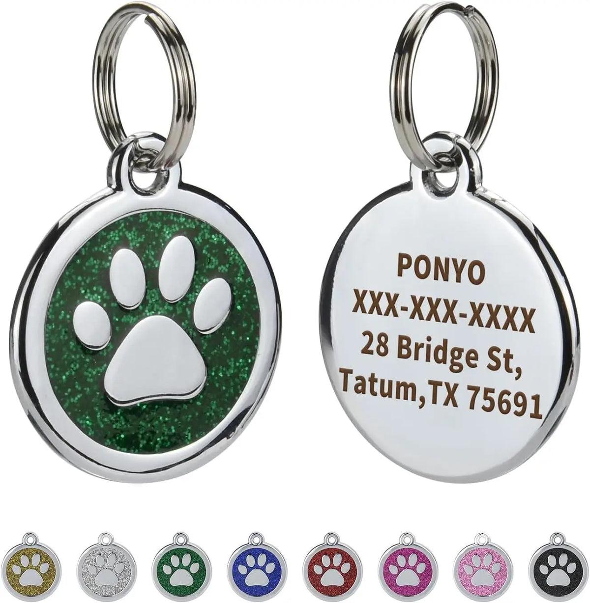 Silver pendant with a green paw print engraved on the surface and a silver bail.