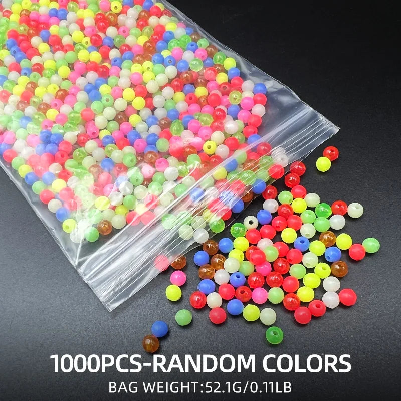 A bag of 1000 pieces of random colored fishing beads spilled out onto a dark surface.