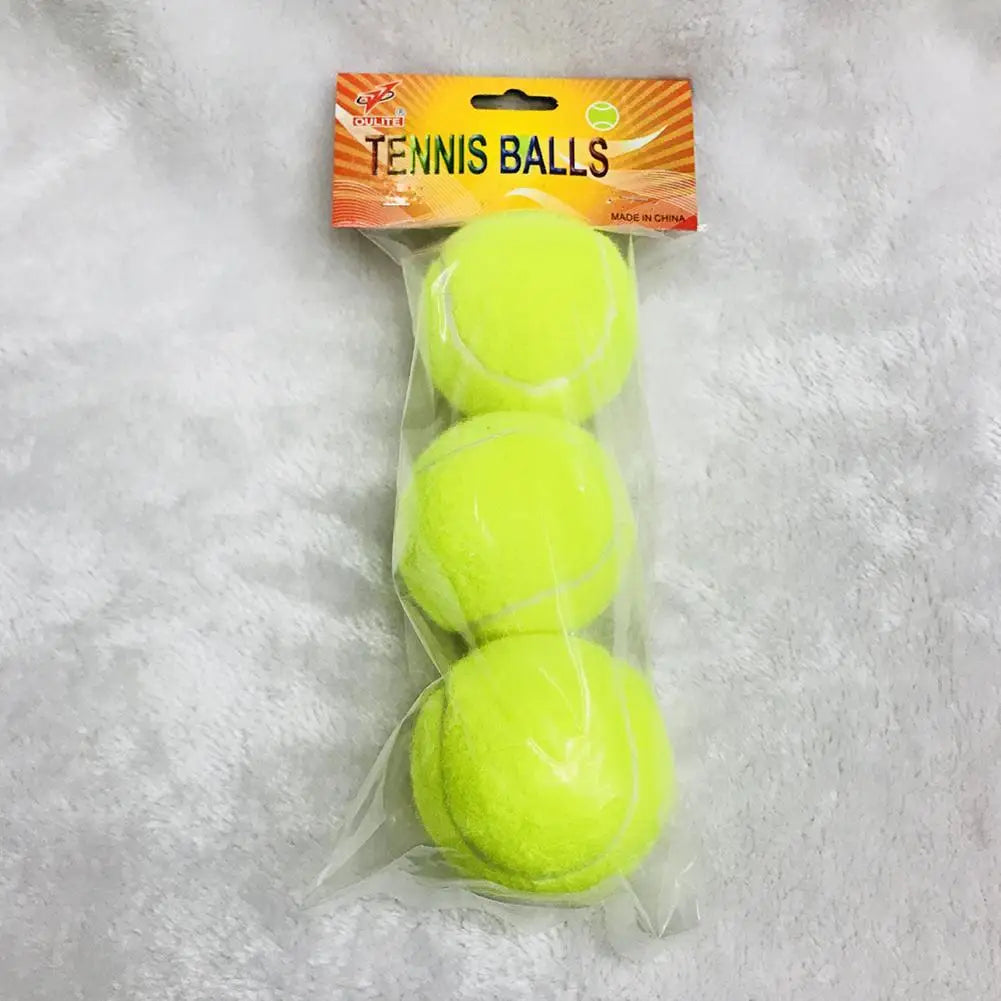 A clear plastic package containing six bright yellow tennis balls with an orange and yellow label.