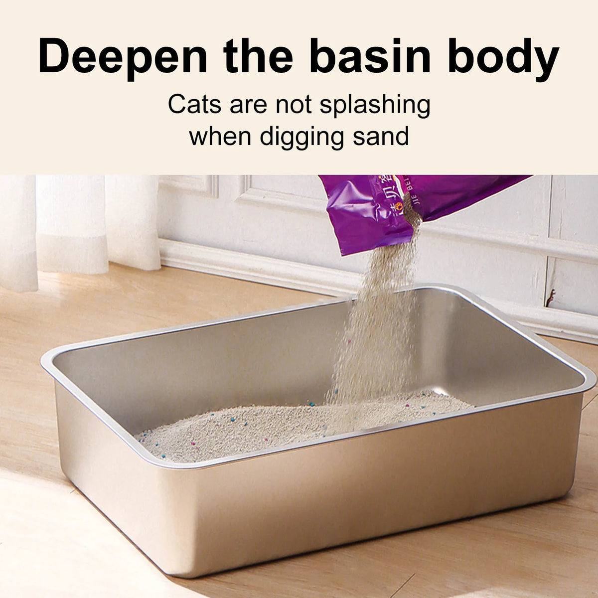 A stainless steel litter box tray filled with white litter, showing a purple bag of litter being poured into the box.