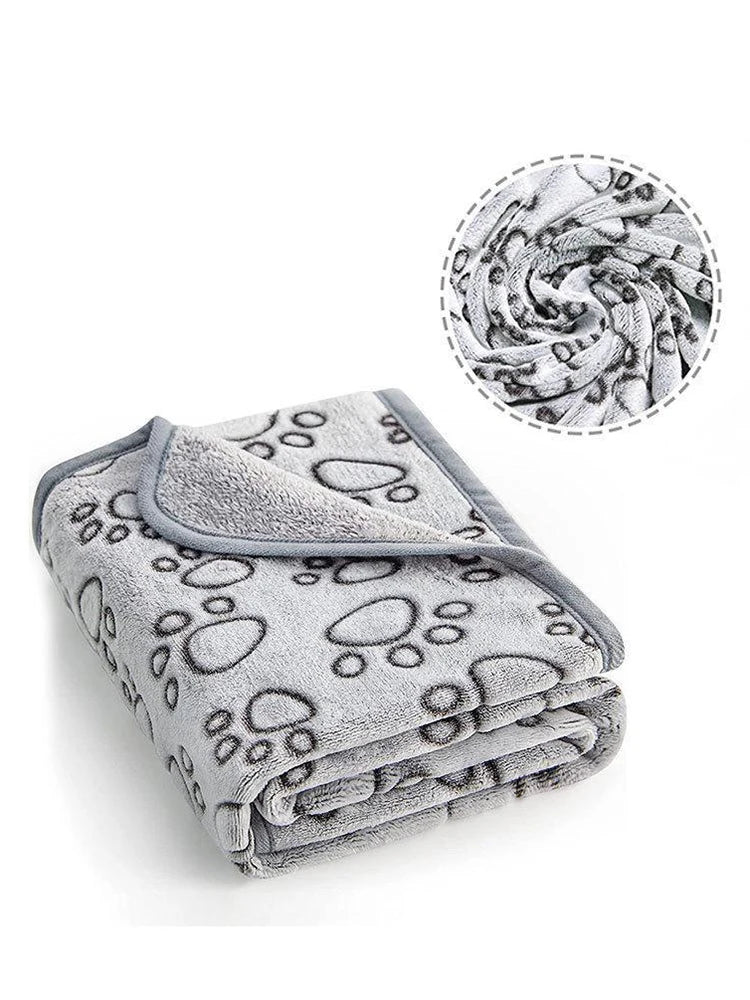 Couverture pour animaux douce et grise avec motif de pattes