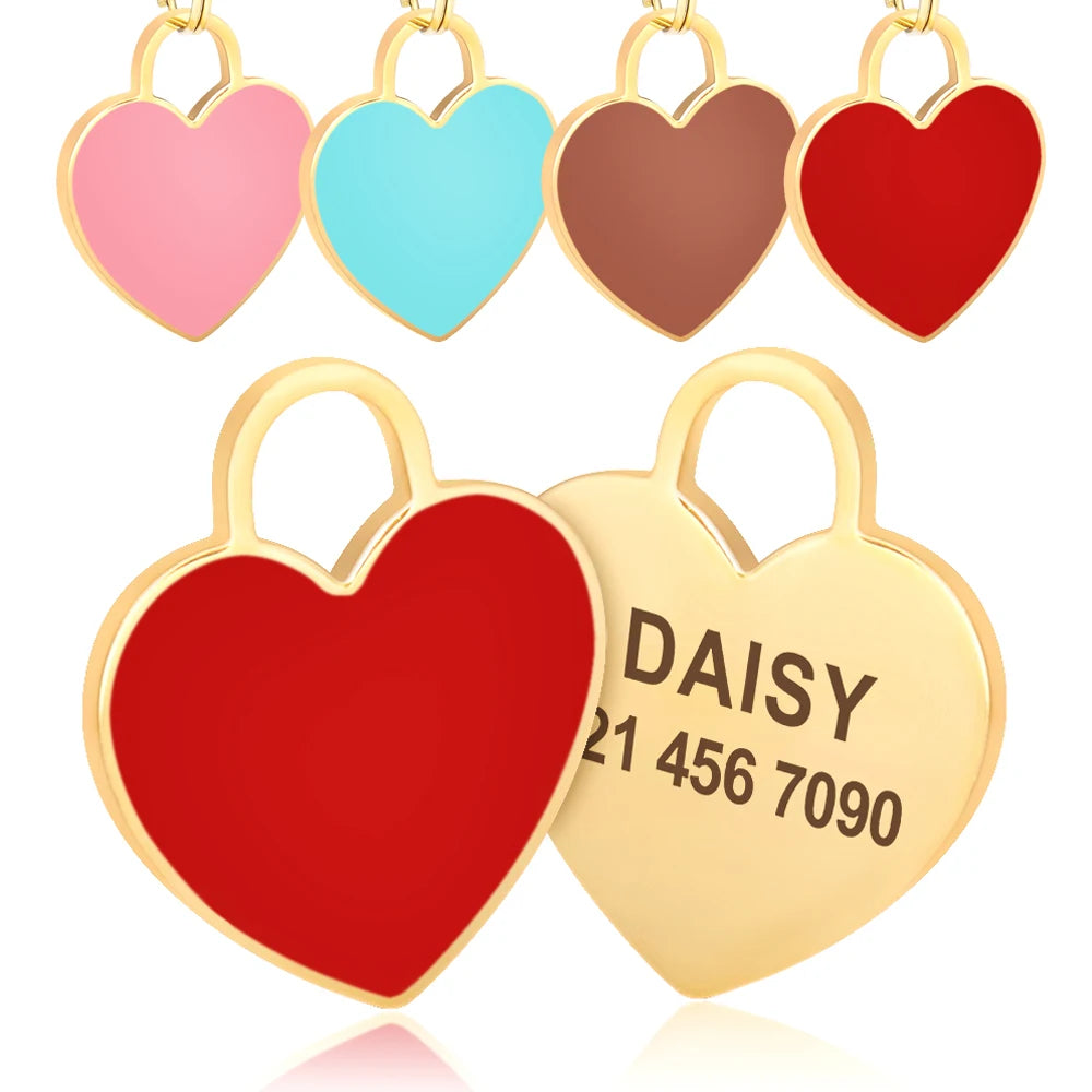 A set of five heart-shaped gold pet ID tags in various colors including pink, light blue, brown, and red.