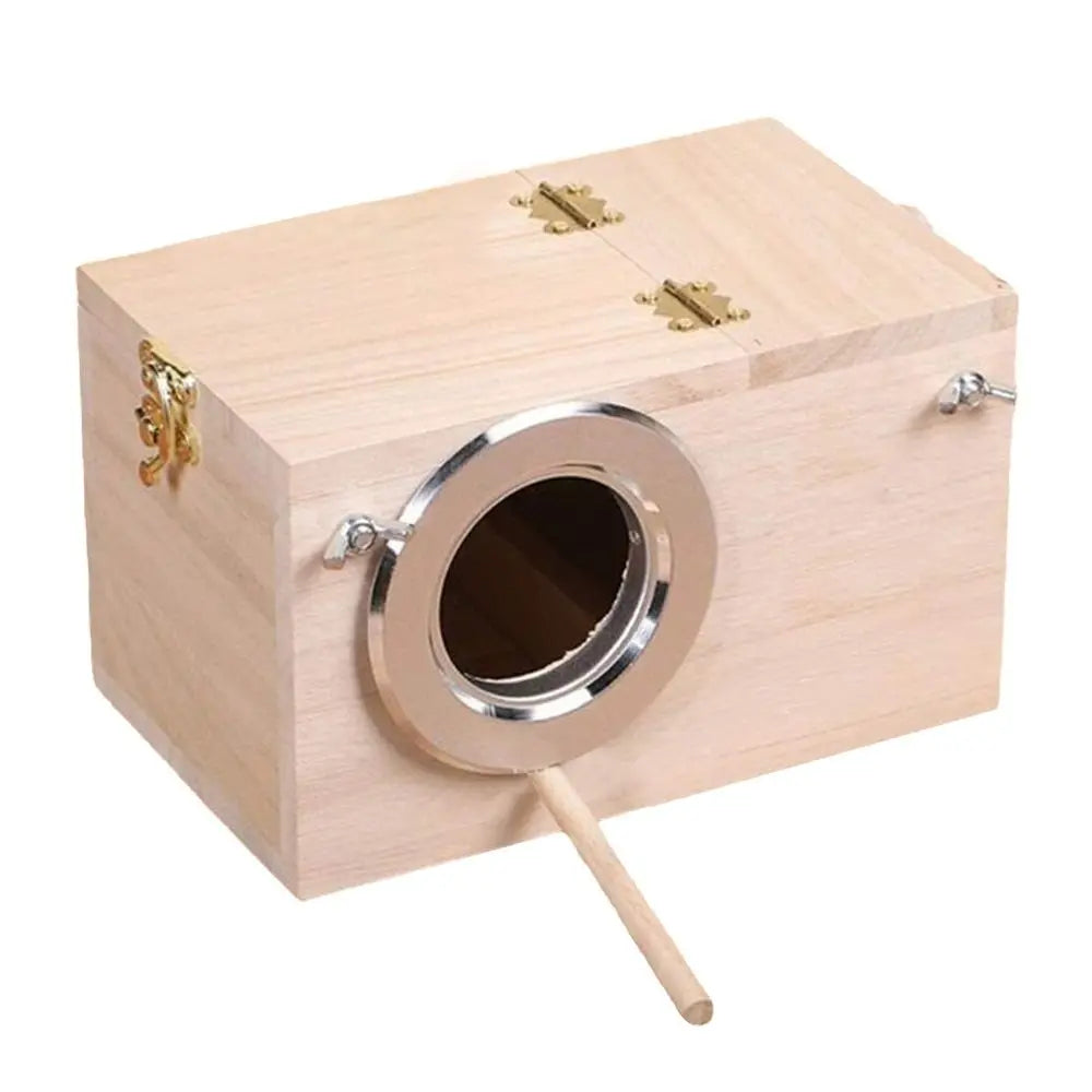 A light wood bird nesting box with a circular entrance and a wooden dowel for hanging.