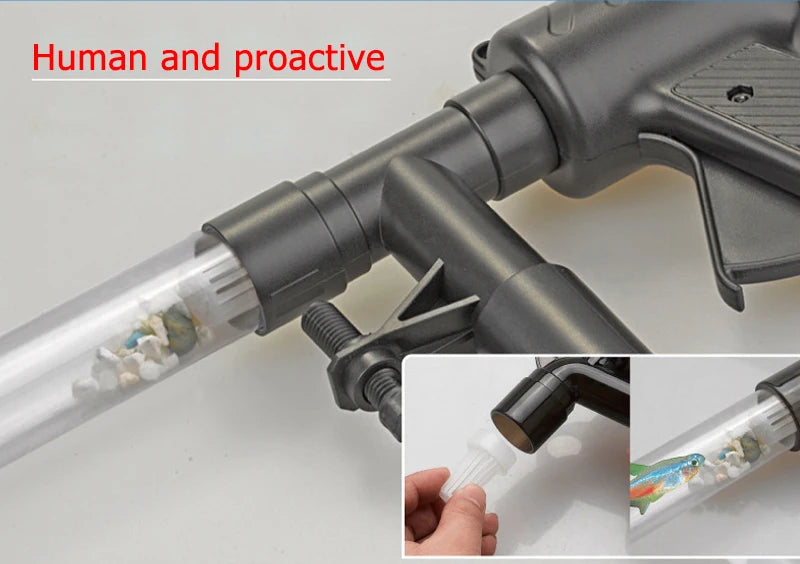 A close-up view of a manual aquarium water change pump and gravel cleaner being used to move water and clean substrate.